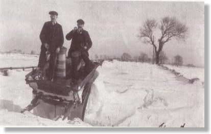 Black and white photograph of severe weather. Heavy snowfall blocking Merrington to Ferryhill road, January 1910