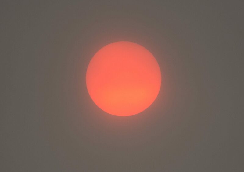 picture of Hazy red sun caused by forest fires