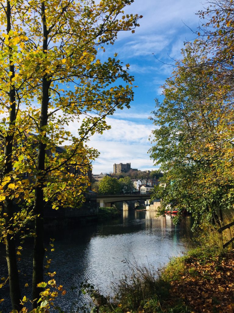 picture of durham castle from beside the river wear